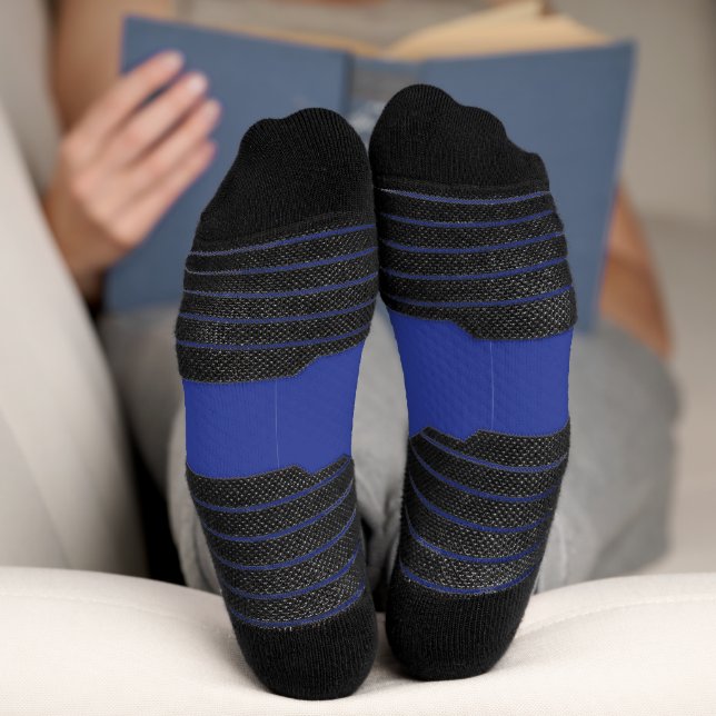 ein Flugzeug, das mit einem blauen Hintergrund in  Socken (Unterseite)