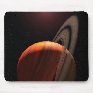 Ein Gasrieseplanet, der einen roten Zwerg in Mousepad