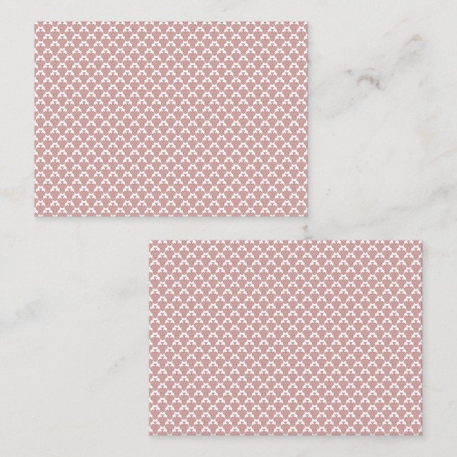 Ein gemusterter Teppich mit roten und braunen Moti Terminkarte (Vorne/Hinten)