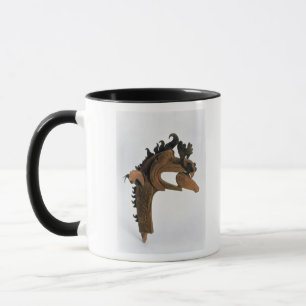 Ein Greif, der ein Rotwild in seinem Schnabel häl Tasse