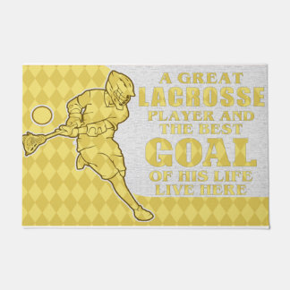 Ein großer Lacrosse Spieler und das beste Ziel sei Fußmatte