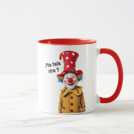 Ein großer mehrfarbiger Clown mit einer großen rot Tasse