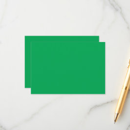 ein grüner Hintergrund mit Begleitkarte