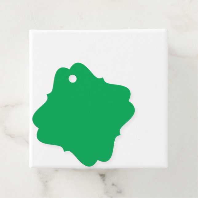 ein grüner Hintergrund mit Geschenkanhänger (Beispiel)