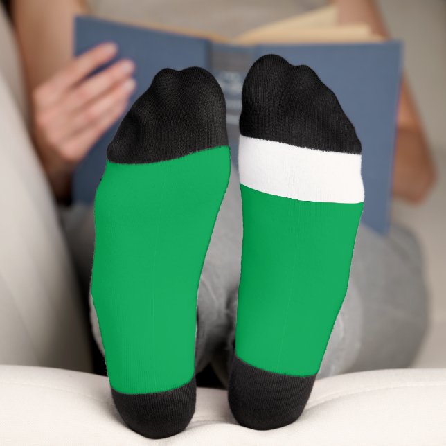 ein grüner Hintergrund mit Socken (Unterseite)