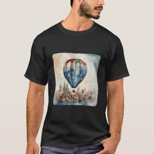 Ein Heißluftballon schwebt über einer Stadt Urbane T-Shirt