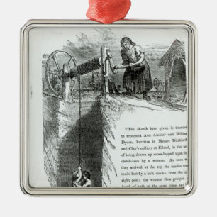 Ein Junge und ein Mädchen, die herauf eine Silbernes Ornament