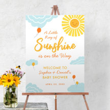 Ein kleines Schild mit Ray Sunshine Baby Shower Bo