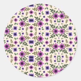 Ein kreisförmiges Blumenmuster zeigt lila und rosa Runder Aufkleber