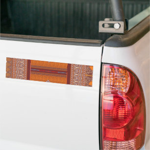 ein Kreuzstich in orange und braun Autoaufkleber