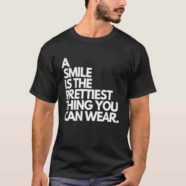 Ein Lächeln ist das hübschste, was man mit Kindne  T-Shirt (Vorderseite)