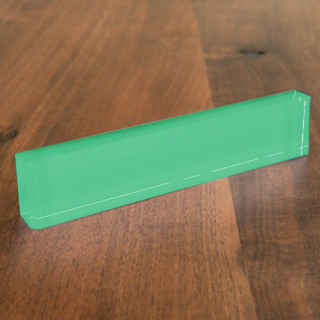 Ein lebendiges grünes Blatt mit prominenten Venen  Namensplakette (Seite)