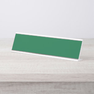 Ein lebendiges grünes Blatt mit verschiedenen Vene Schreibtischnamensplakette