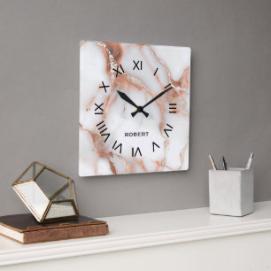 Ein luxuriöser roségoldener Marmorhintergrund Quadratische Wanduhr