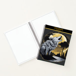 Ein majestätischer Wolf heult am glühenden Mondsch Notizbuch