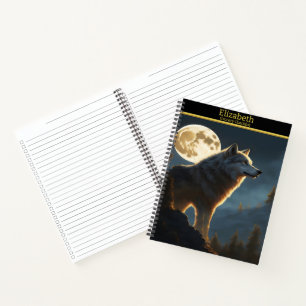 Ein majestätischer Wolf heult unter einem Vollmond Notizbuch