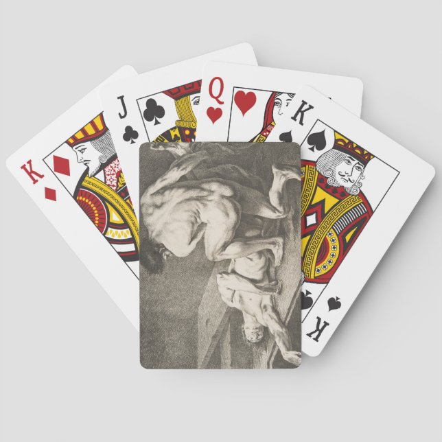 Ein Mann hebt die Legen eines anderen Mannes Spielkarten (Rückseite)