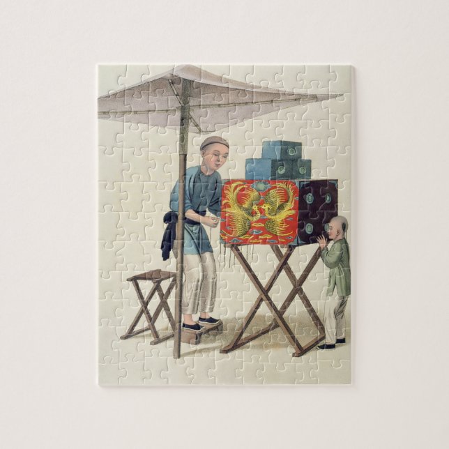 Ein Mann mit einer Raree-Show, überziehen 10 'vom (Vertikal)