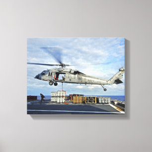 Ein MH-60S Seahawk bereitet vor sich, ammunitio zu Leinwanddruck