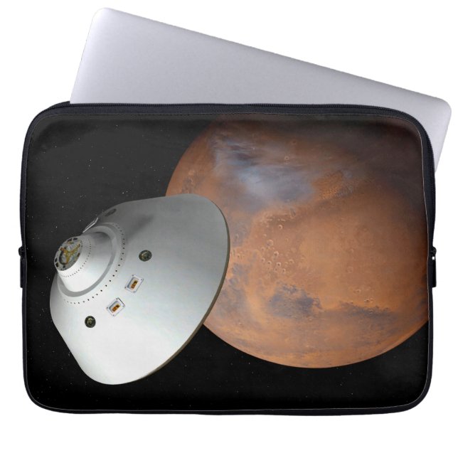 Ein mit Aeroshell angereichertes Raumfahrzeug nähe Laptopschutzhülle (Vorderseite)