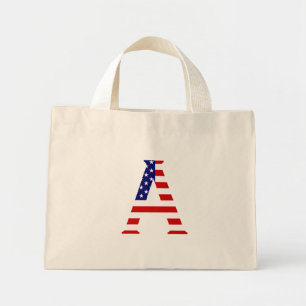 Ein Monogramm überlagert sich auf der US-Flagge tt Mini Stoffbeutel