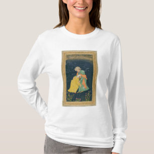Ein Mulla, der unten zu einem Mann im iranischen T-Shirt