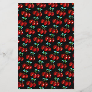 Ein Muster der roten Kirschen auf den Blätter der 