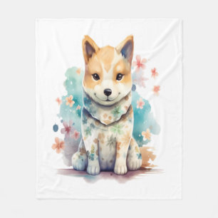 Ein niedlicher, gut benommen Hund in einer Blüte Fleecedecke