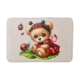 Ein Niedlicher Teddybär, verkleidet wie ein Ladybu Badematte