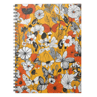 Ein Notebook mit botanischer und schmetternder Kun Notizblock