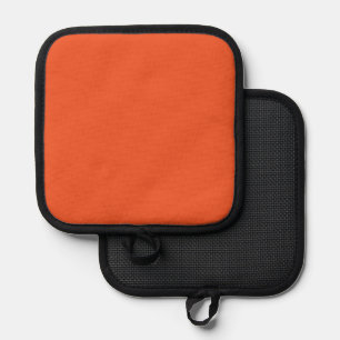 ein orangefarbener Hintergrund mit schwarzer Grenz Topflappen