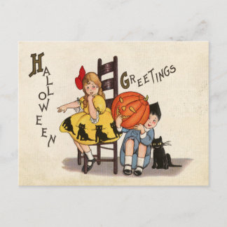 Ein paar Kinder mit geschnitztem Kürbis, Halloween Postkarte