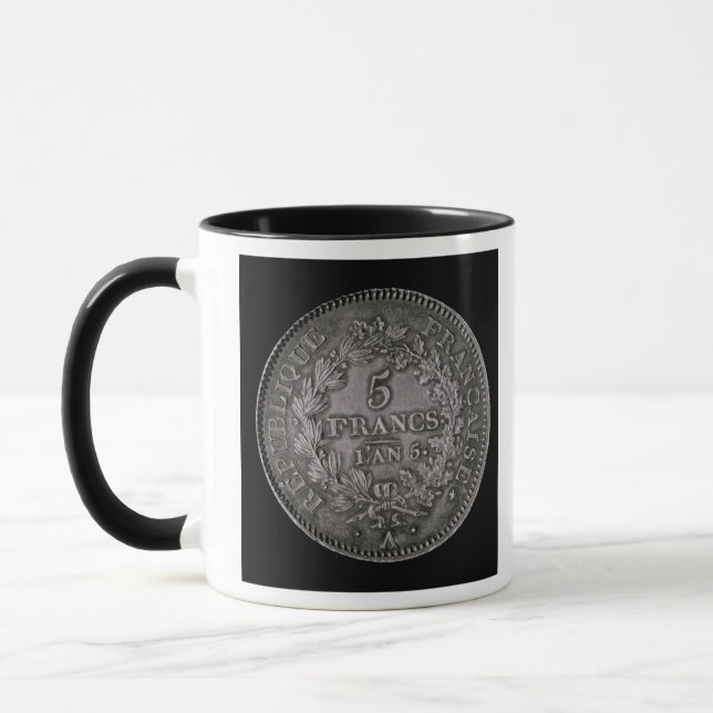 Ein Pfund von zwanzig Solen Tasse (Links)