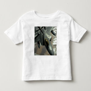 Ein Raubvogel der US-Luftwaffe-F-22 wird durch Kleinkind T-shirt
