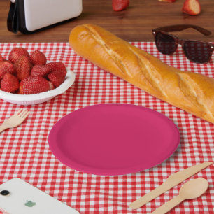 ein rosa Hintergrund mit einem weißen Rand Pappteller