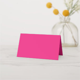 ein rosa Hintergrund mit schwarz Platzkarte
