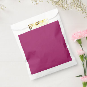 ein rosa Hintergrund mit weißem Hintergrund Geschenktütchen
