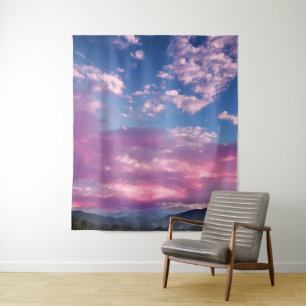 Ein rosa leuchtender Sonnenaufgang Wandteppich