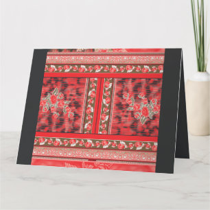 ein rot-grünes Blumendesign auf schwarzem Hintergr Dankeskarte