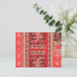 ein rot-grünes Blumendesign auf schwarzem Hintergr Postkarte