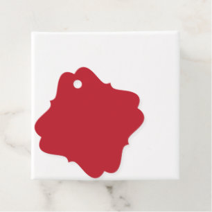 ein roter Hintergrund mit Geschenkanhänger