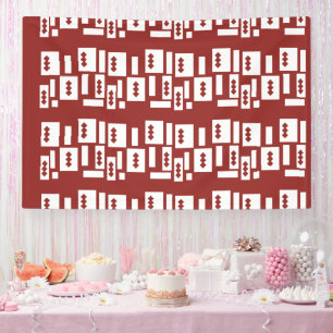 Ein roter Teppich mit einem textilen Muster wird a Banner