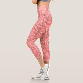 ein roter und weißer Hintergrund mit einem Muster Capri Leggings