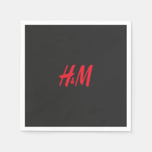 ein rotes h- und m-Logo auf schwarzem Hintergrund Serviette