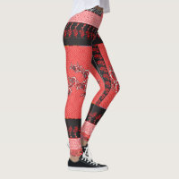 ein rotes und schwarzes Muster mit Blume darauf