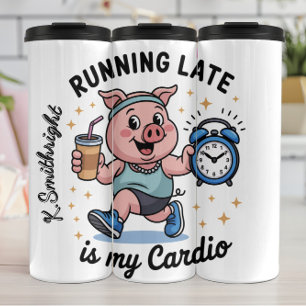Ein Running Pig mit einer Uhr Thermosbecher