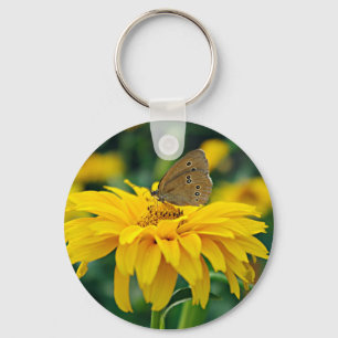 Ein Schmetterling auf einem gelben Blume-Schlüssel Schlüsselanhänger