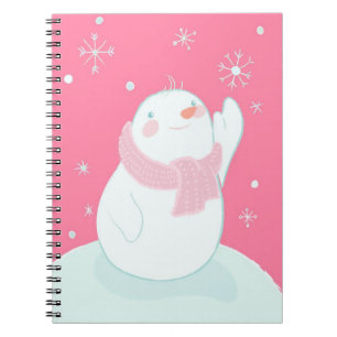 Ein Schneemann, der für eine fallende Schneeflock Notizblock