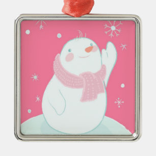 Ein Schneemann, der für eine fallende Schneeflocke Silbernes Ornament