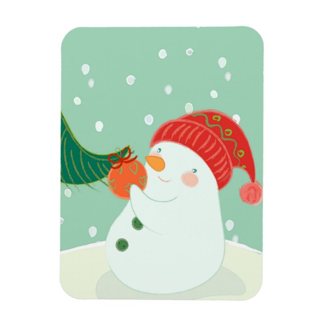 Ein Schneemann hängt ein Ornament an einem Baum Magnet (Vertikal)